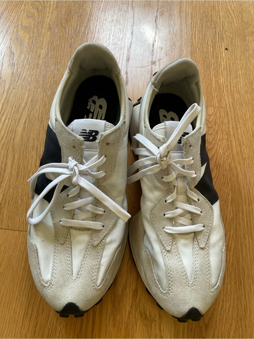 New Balance White and Black Low-Profile Sneakers